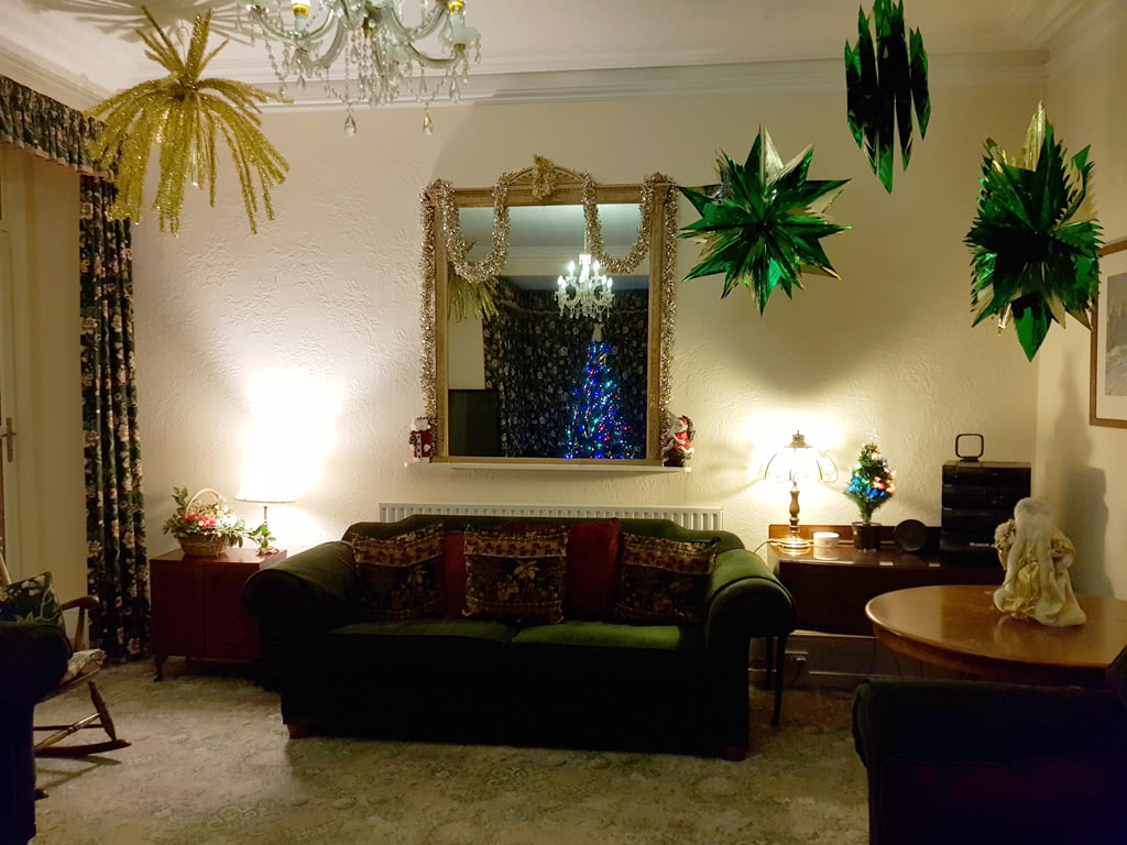 Christmas at the Grange, the lounge in front of the tree
