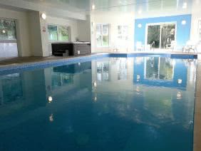 40' indoor heated swimming pool and hot tub