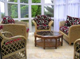 Relax in the lovely conservatory - perfect in the sun!